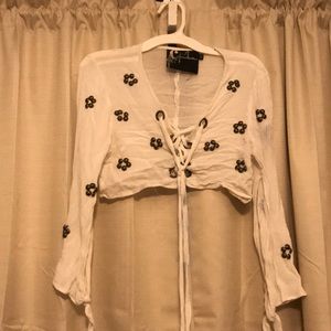 Long sleeve crop top criss cross front